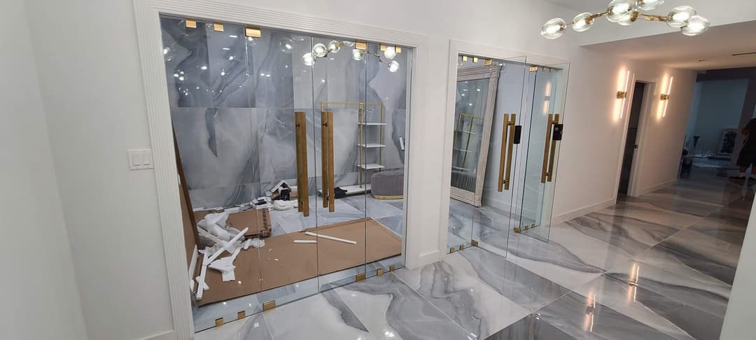glass sliding closet doors, gold hardware