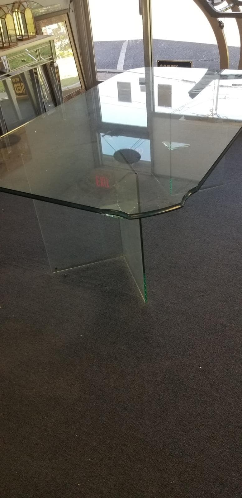 glass dining table, showroom setting
